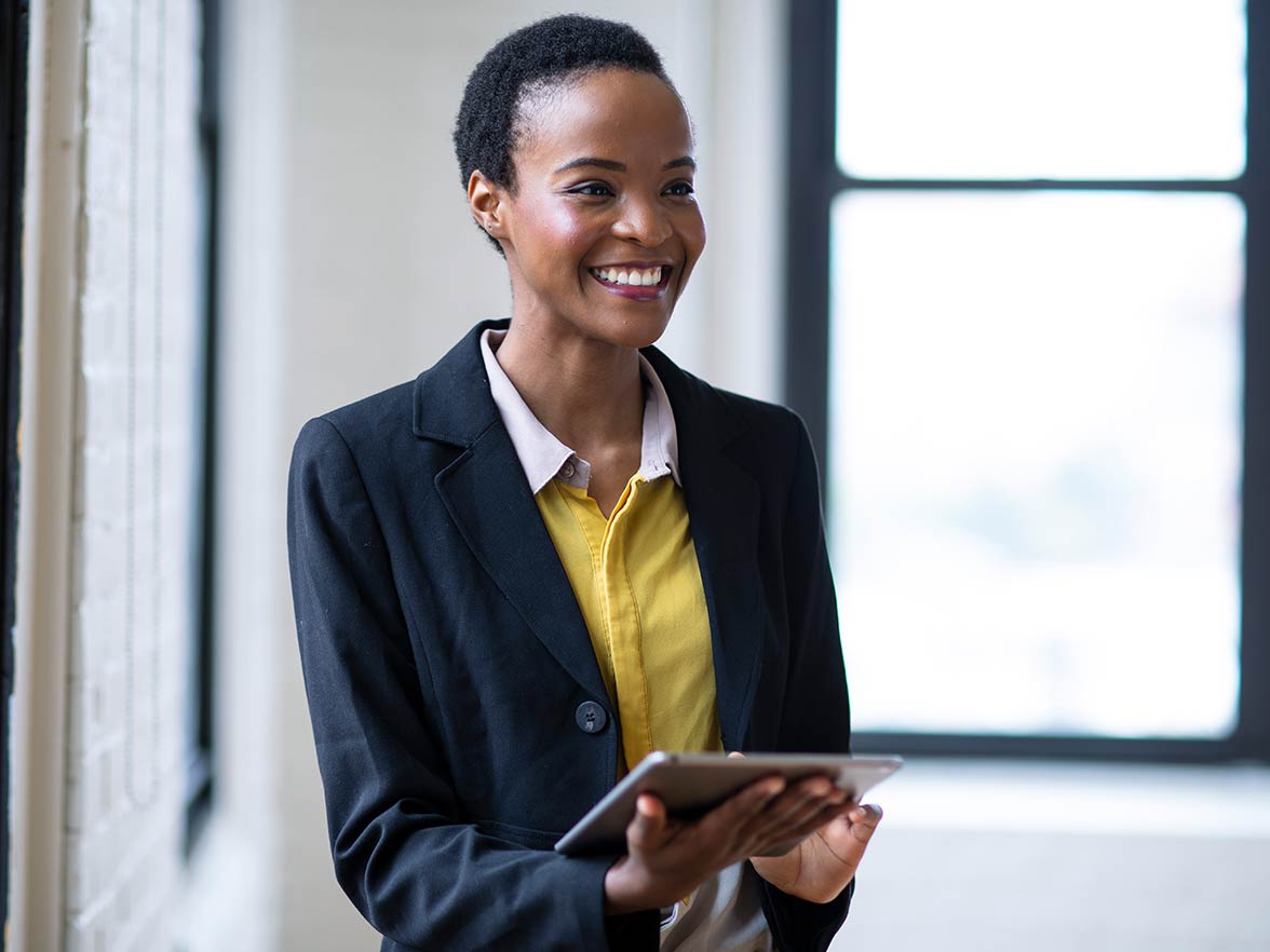 Millennial woman working with a tablet