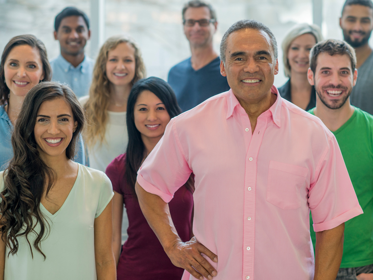 group of employees smiling