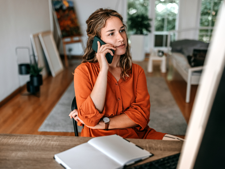 Young professional woman working from home