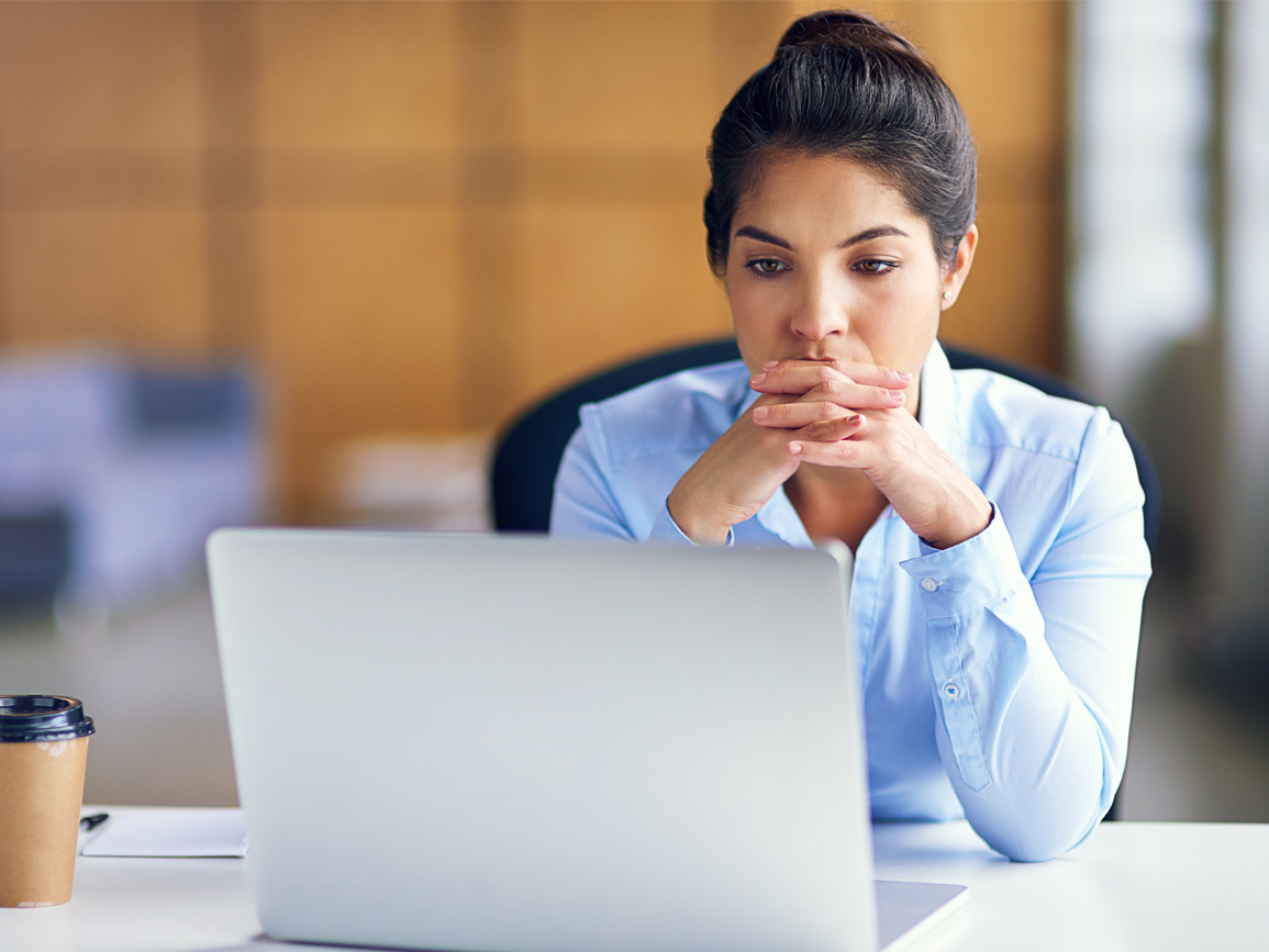 young female professional at laptop