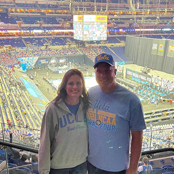 Jennifer Vena and her husband at a UCLA Bruins game