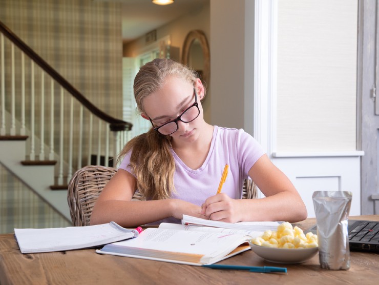 student with books