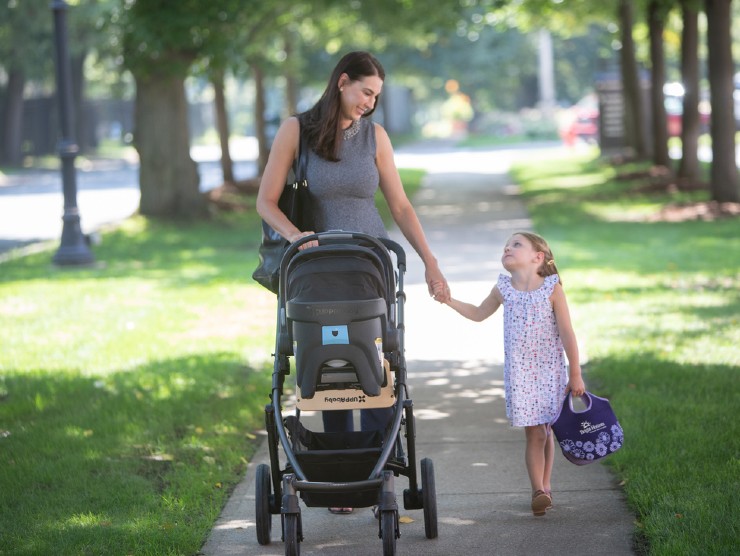 mom and daughter walking