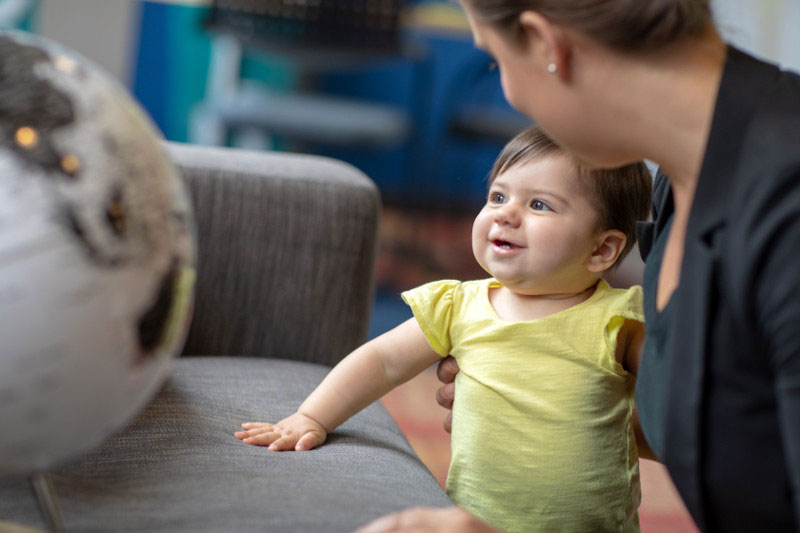 Working mom with baby in the office