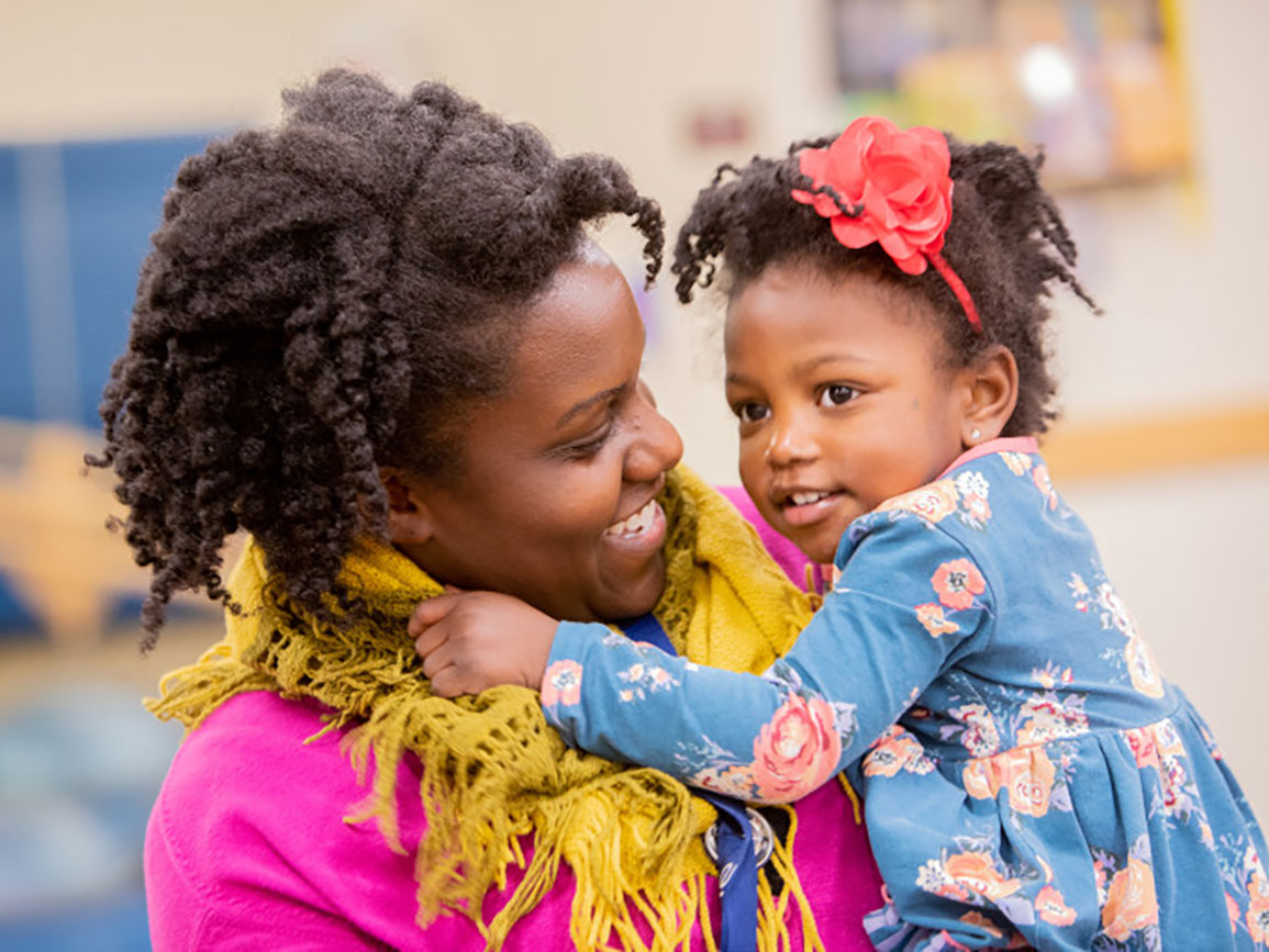 Mom exhibiting different parenting styles with her young daughter