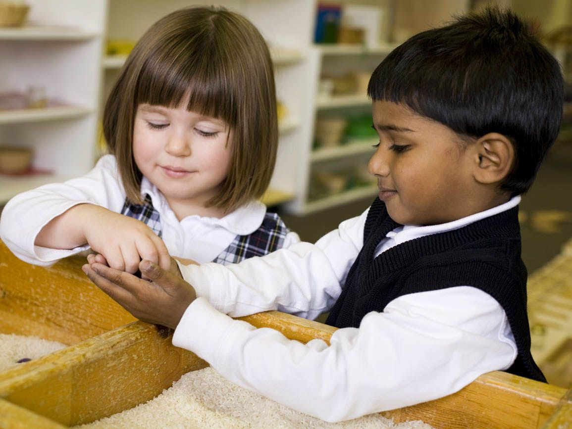 A young boy and girl playing together