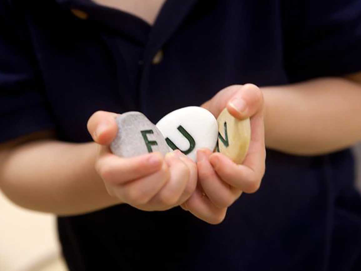 Kids hands holding letters