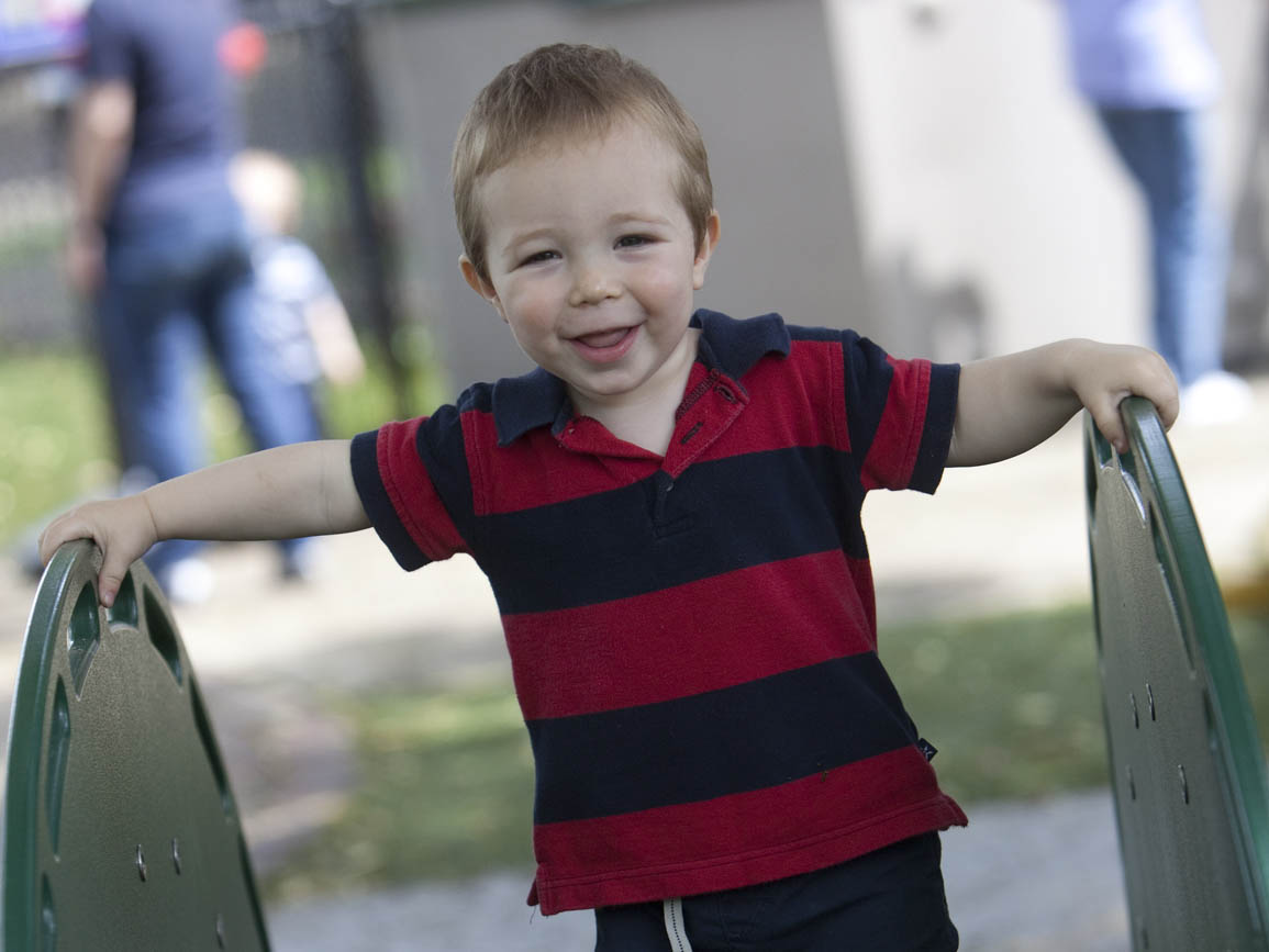 A child at the top of a slide