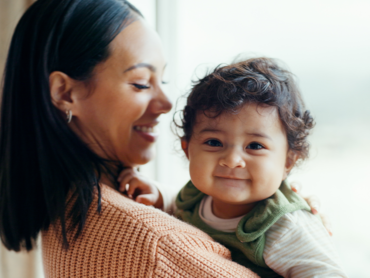 Mom holding infant