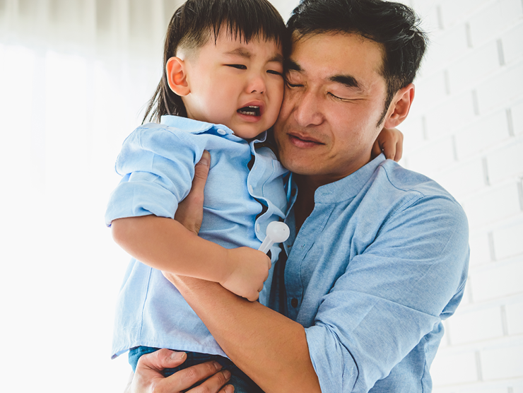 Father with crying toddler